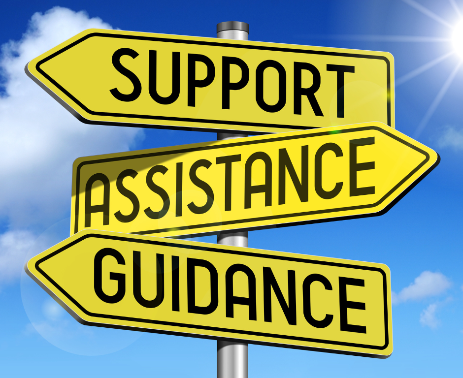 Yellow signs with arrows pointing in different directions with blue skies behind